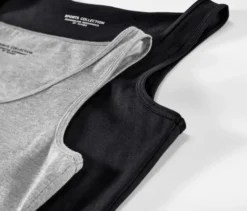 2 Tops, schwarz/grau meliert